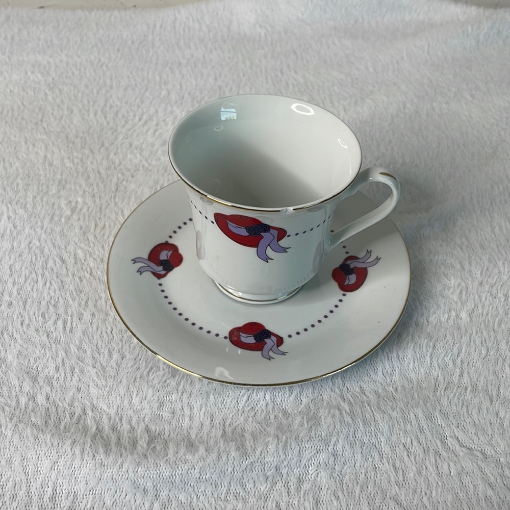 Darice Red Hat Club porcelain tea cup and saucer with gold trim
